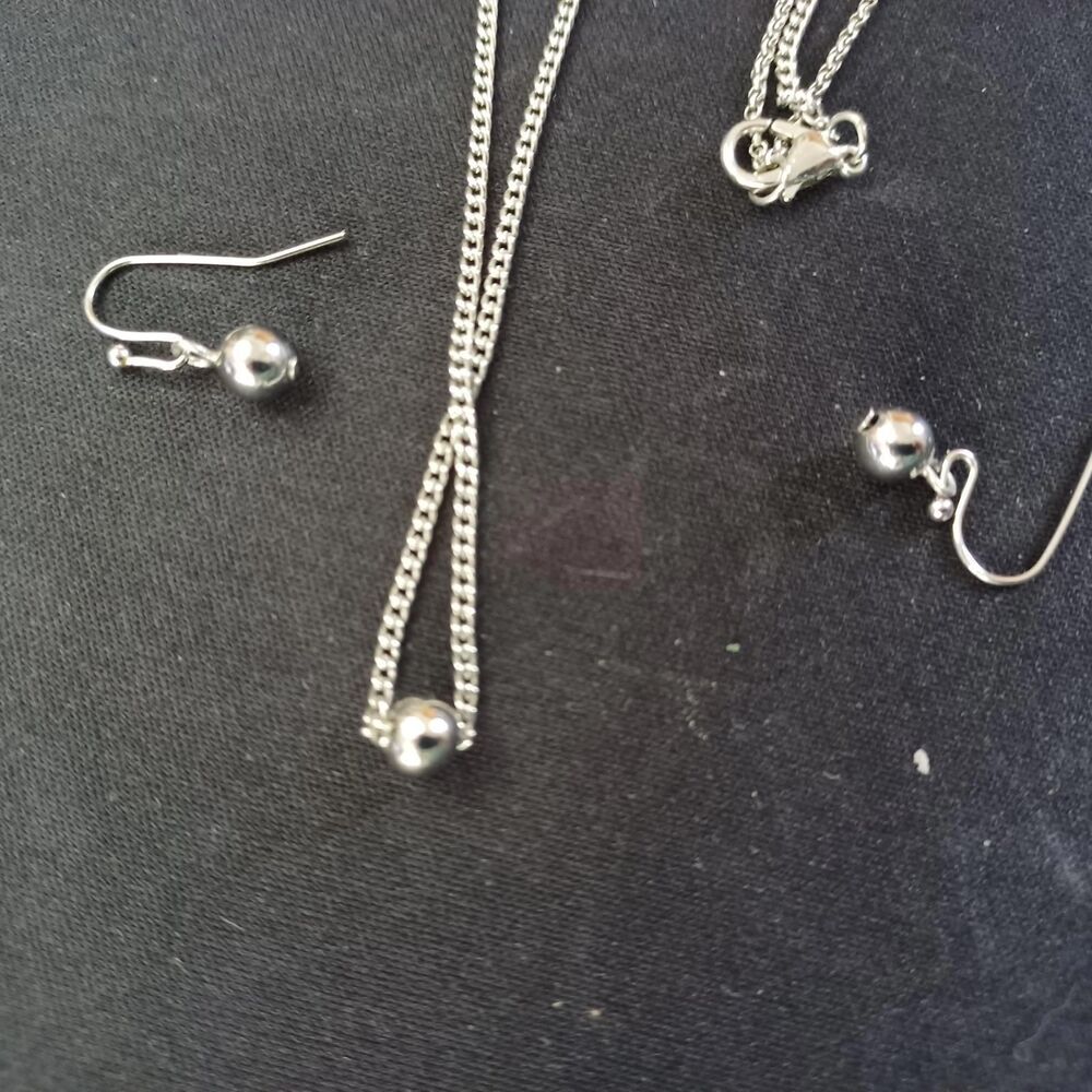 Silver drop necklace and earrings